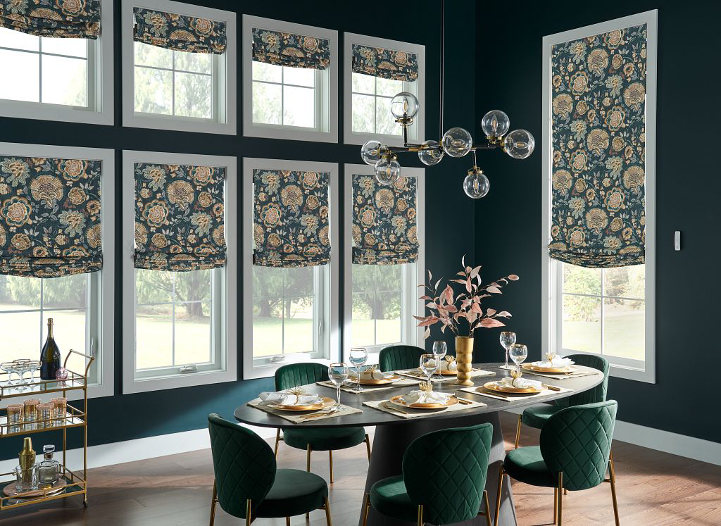 textured roman draperies in this emerald green and wood formal dining room bring drama and luxury