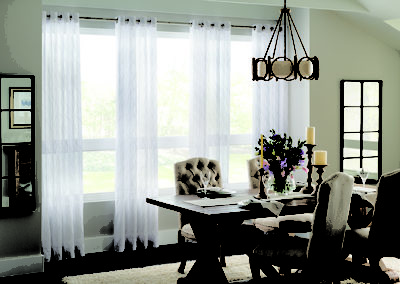 Sheer panels soften lines in windows while still letting plenty of light come through.
