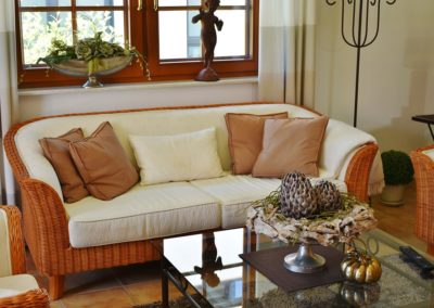 Indoor wicker furniture has come a long way. It adds so much texture to the couch.