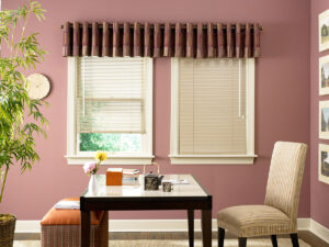 Dark pink valance in an office with pink walls